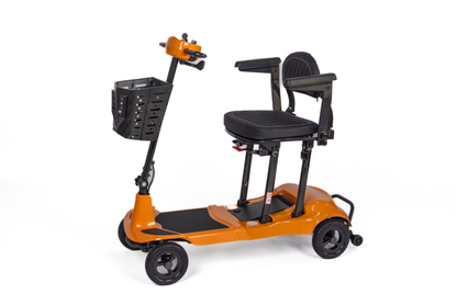 Orange Monarch Mobility Genie Ultralight folding mobility scooter with padded seat, armrests, and front basket.