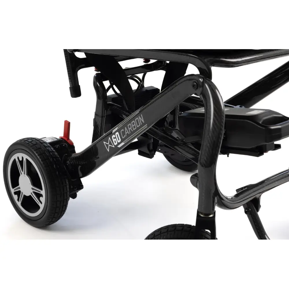 Close-up of Monarch MM60 lightweight electric wheelchair carbon fiber frame
