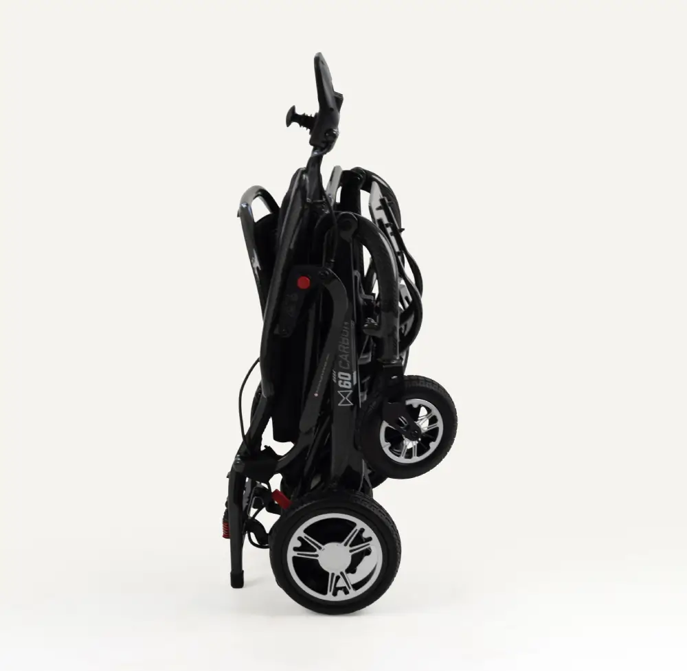 Monarch MM60 carbon lightweight folding electric wheelchair folded for transport and storage